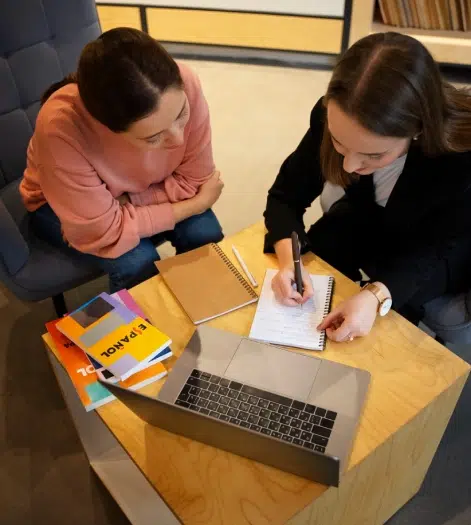 Therapist taking notes while consultation